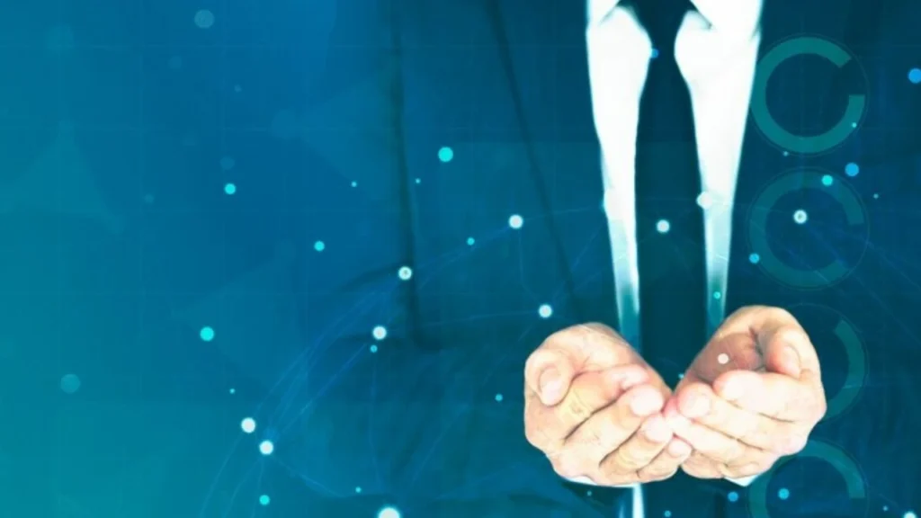 Imagem de um homem em terno com as mãos abertas, simbolizando receptividade e oportunidades de negócios, ideal para discussões sobre networking e negócios.