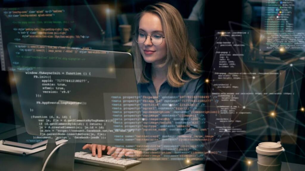 Mulher programadora analisando códigos em um computador. Ambiente de trabalho moderno com elementos de tecnologia e café na mesa.